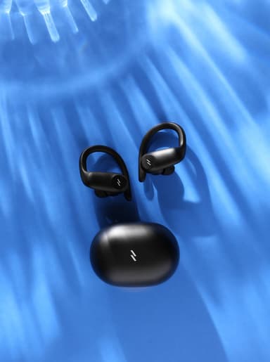 ZIZO Encore Sport Active Wireless Earbuds in Black with their charging case on a rippled blue surface